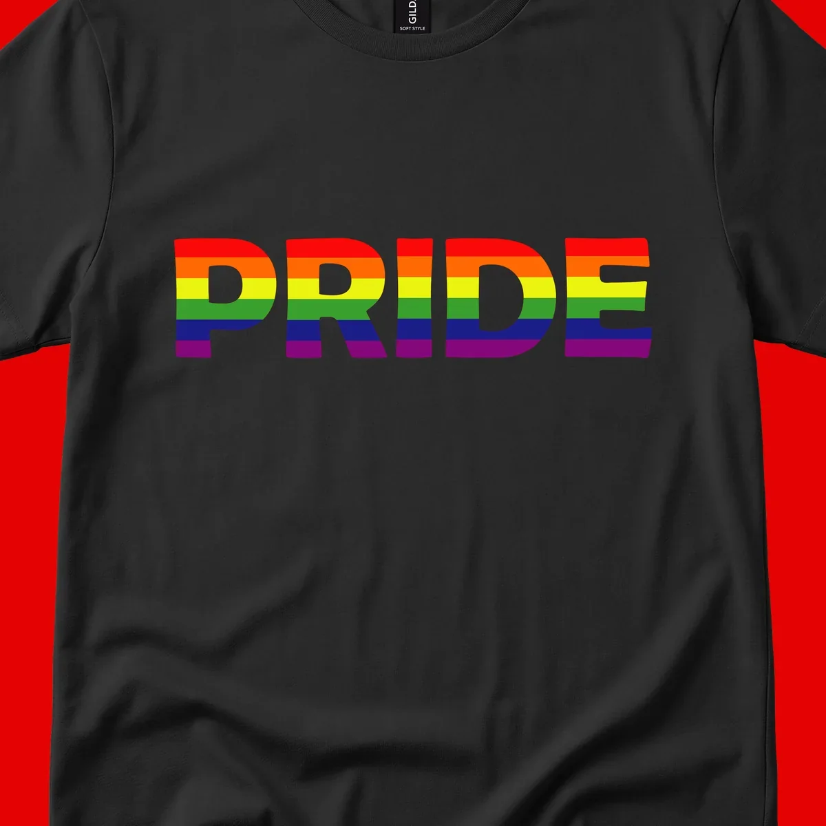 The word PRIDE in large letters filled with rainbow pride flag stripes on gray background