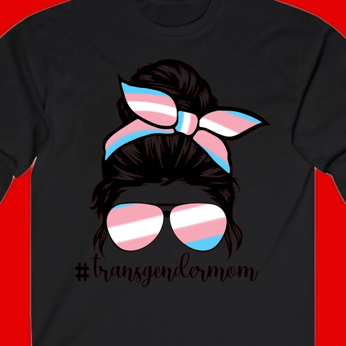 Stylized portrait with black hair, cat-eye sunglasses and bow in transgender flag colors, #transgendermom text below