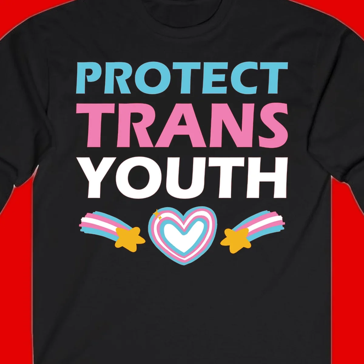 Protect trans youth design with cyan, pink, and white text, rainbow heart, and gold stars on gray background