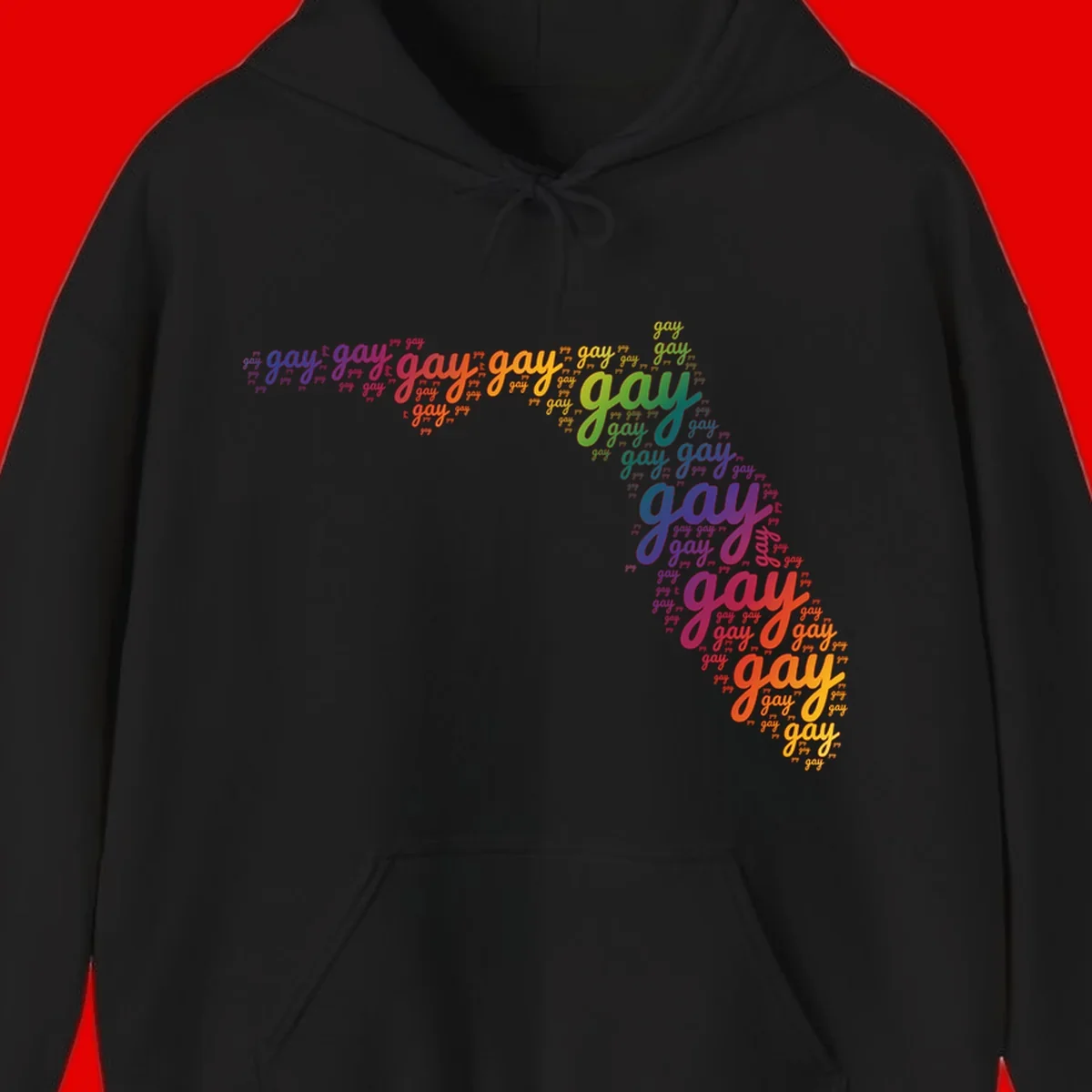 Gay pride word cloud with 'gay' repeated in rainbow colors including blue, purple, red, orange, yellow, and green on gray background