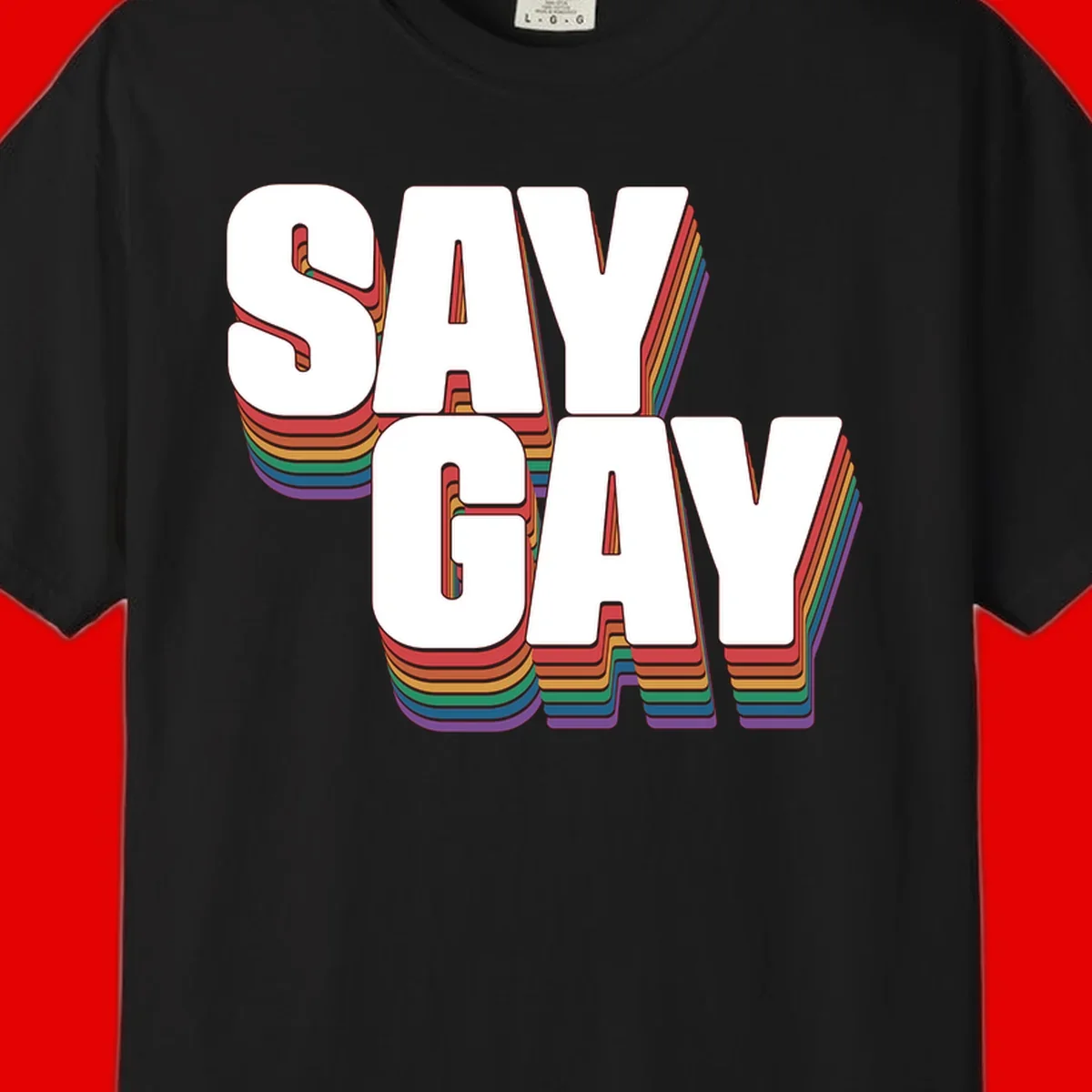 Say gay pride rainbow typography design with bold white text and vibrant layered rainbow stripes in 3D effect