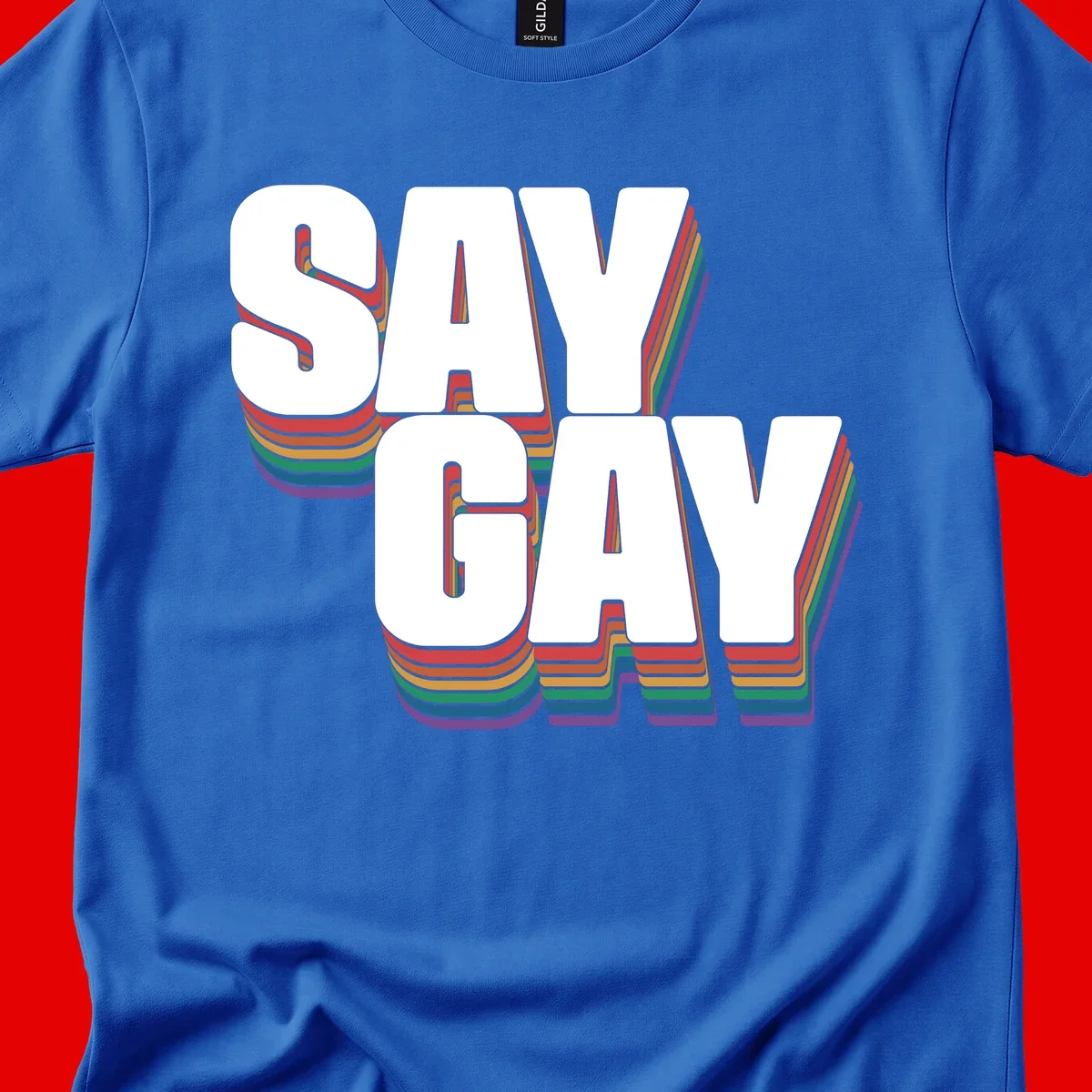 Say gay pride rainbow typography design with bold white text and vibrant layered rainbow stripes in 3D effect