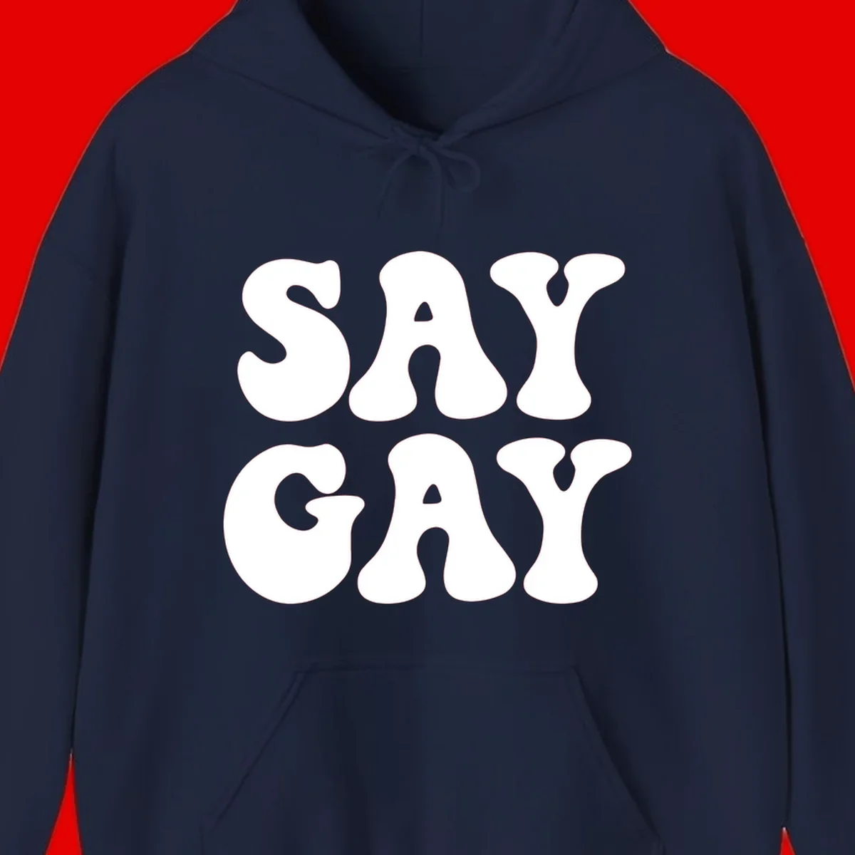 Say Gay Pride design with bold white letters featuring organic rounded typography on gray background