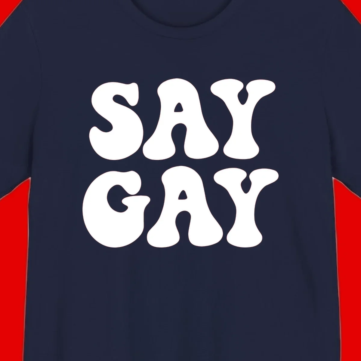 Say Gay Pride design with bold white letters featuring organic rounded typography on gray background