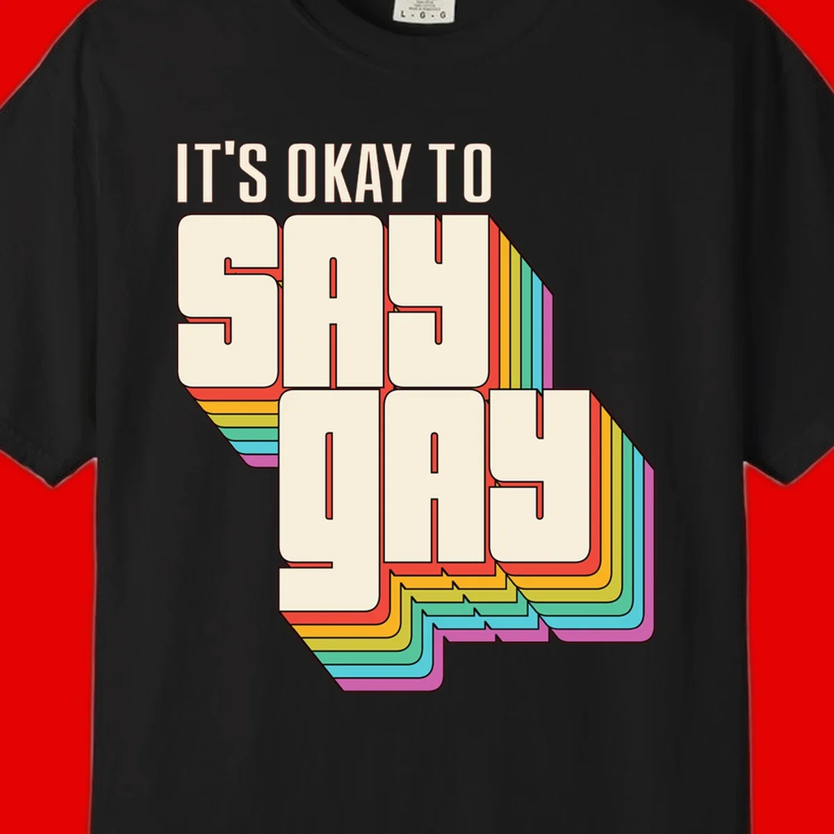 3D block letter design reading 'It's Okay To Sigh Out Loud' with rainbow-colored layered borders and pride flag stripes
