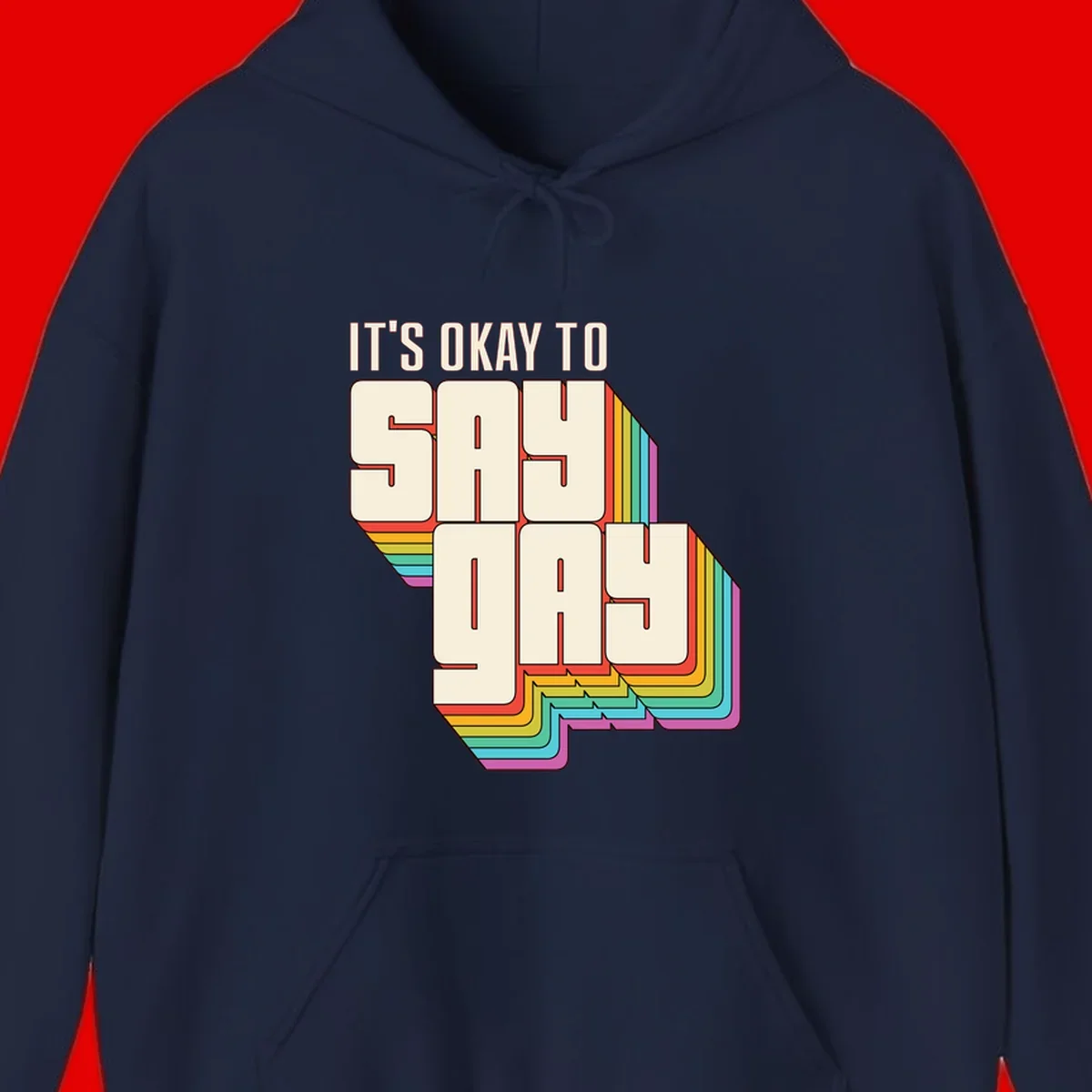 3D block letter design reading 'It's Okay To Sigh Out Loud' with rainbow-colored layered borders and pride flag stripes