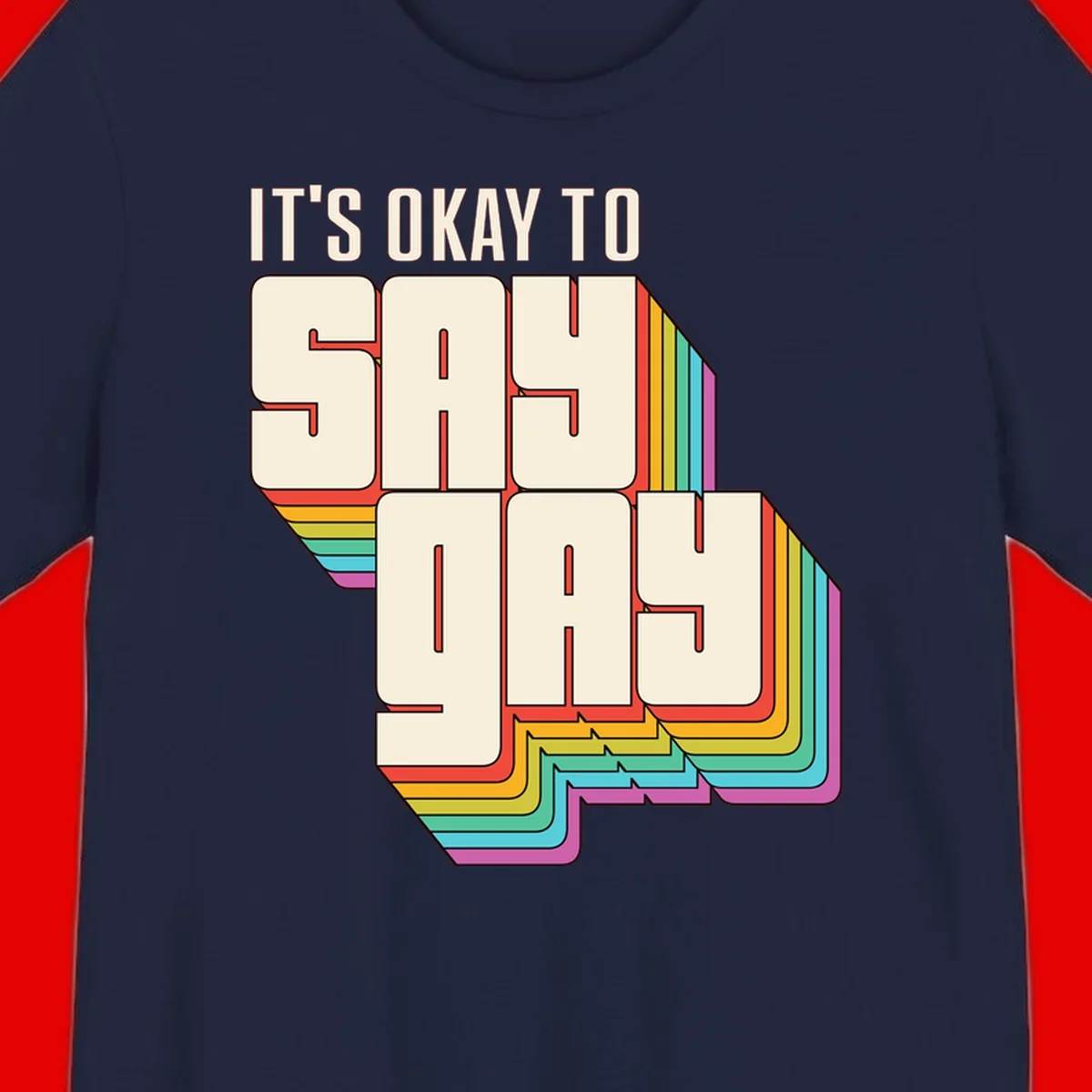 3D block letter design reading 'It's Okay To Sigh Out Loud' with rainbow-colored layered borders and pride flag stripes