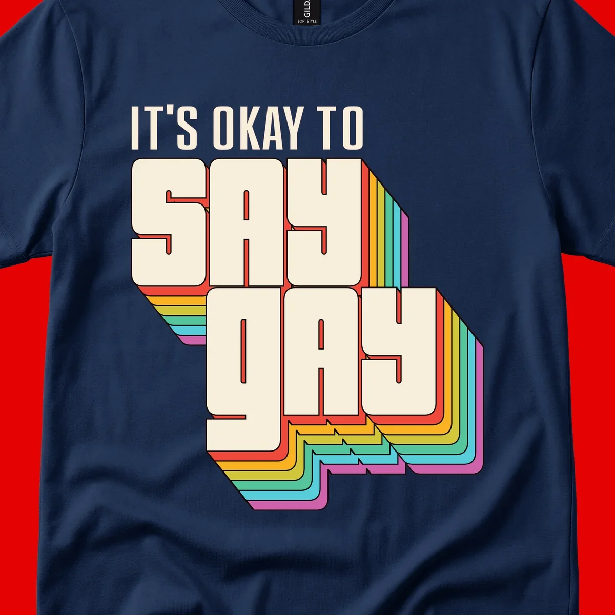 3D block letter design reading 'It's Okay To Sigh Out Loud' with rainbow-colored layered borders and pride flag stripes