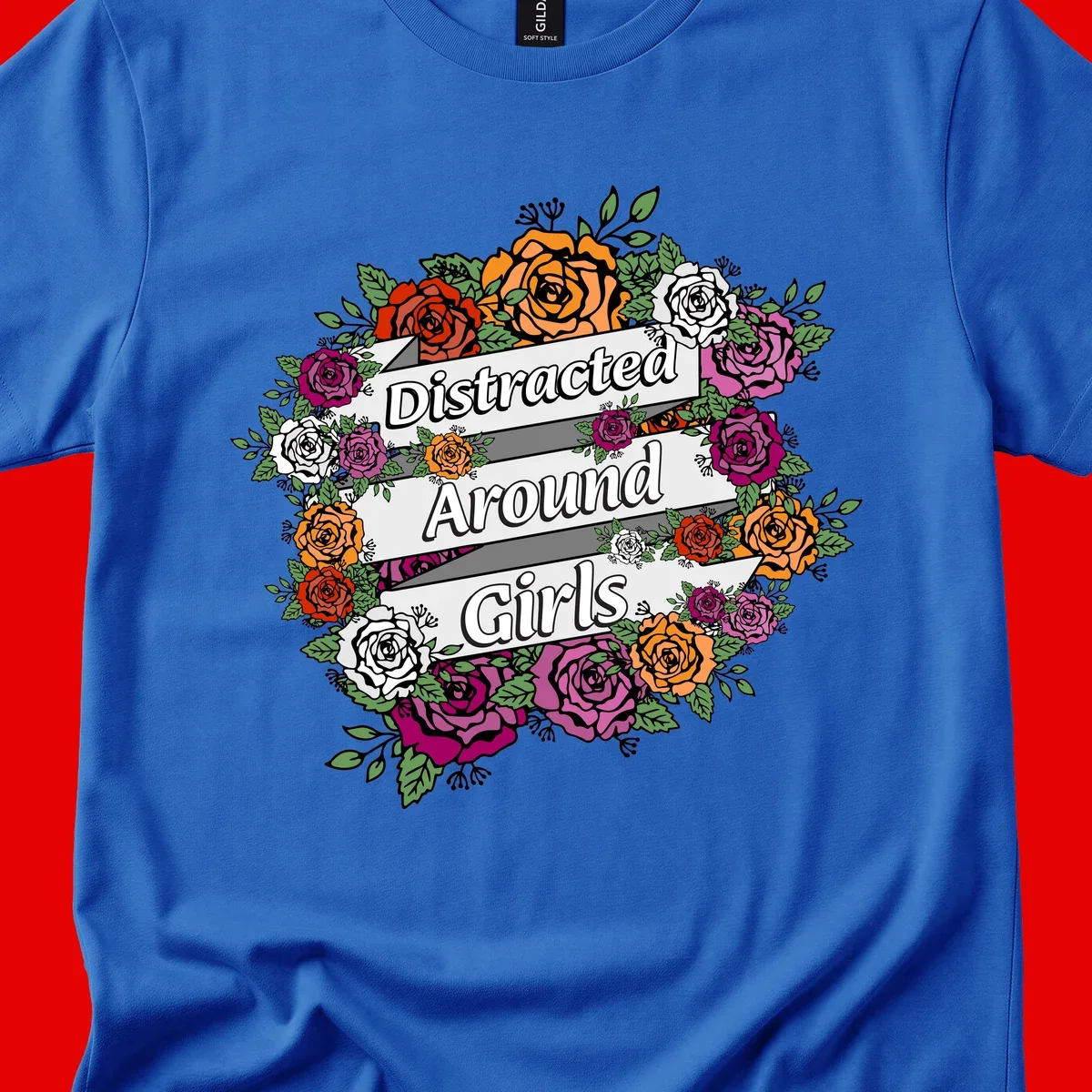 Distracted around girls design: colorful rose wreath in red, orange, white, and purple with ribbon banners