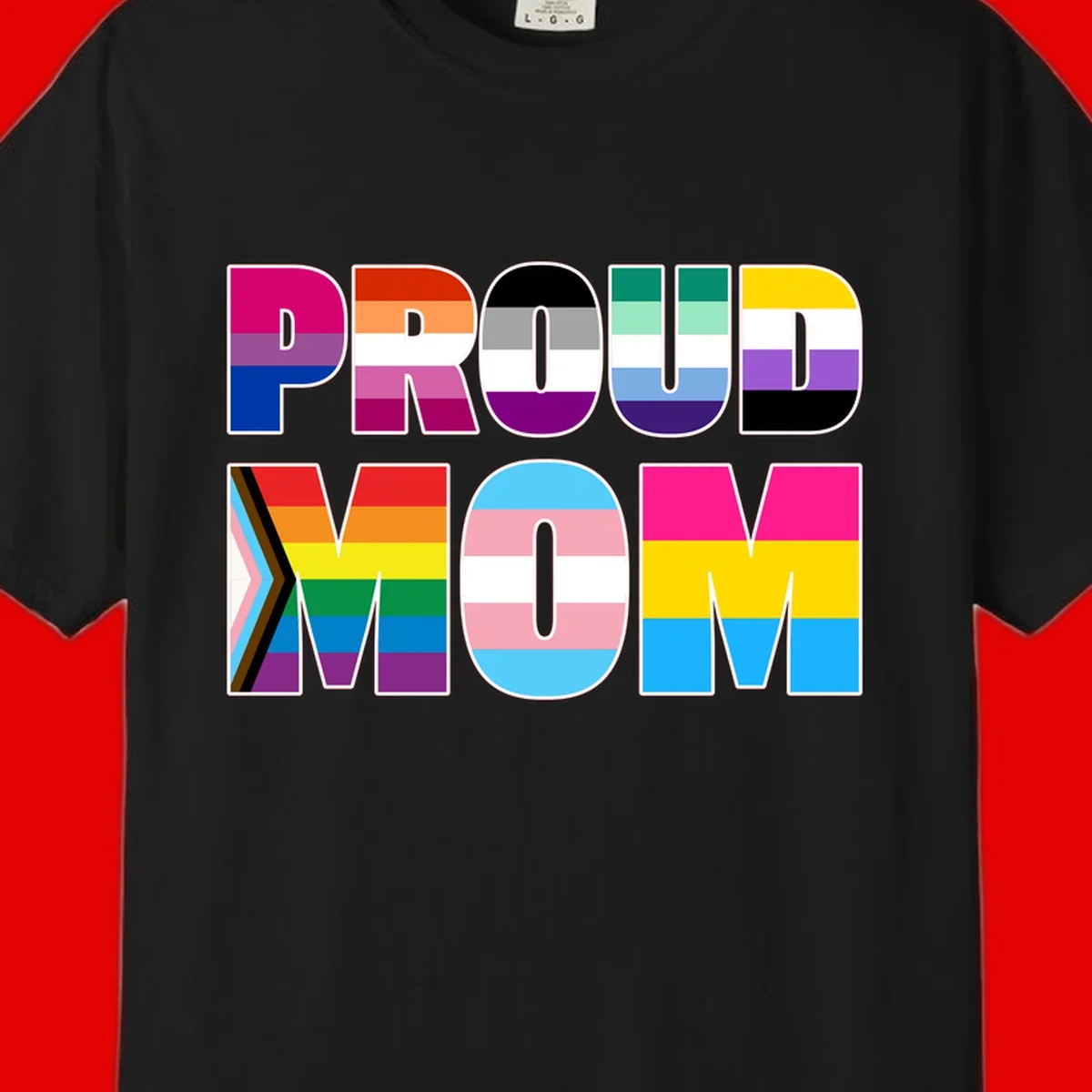 Colorful 'PROUD' letters filled with various pride flags including rainbow, trans, progress pride, and intersex symbols on gray background