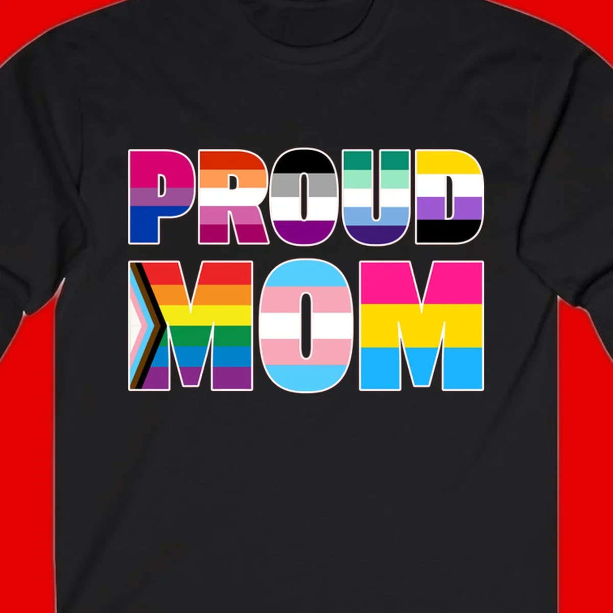 Colorful 'PROUD' letters filled with various pride flags including rainbow, trans, progress pride, and intersex symbols on gray background