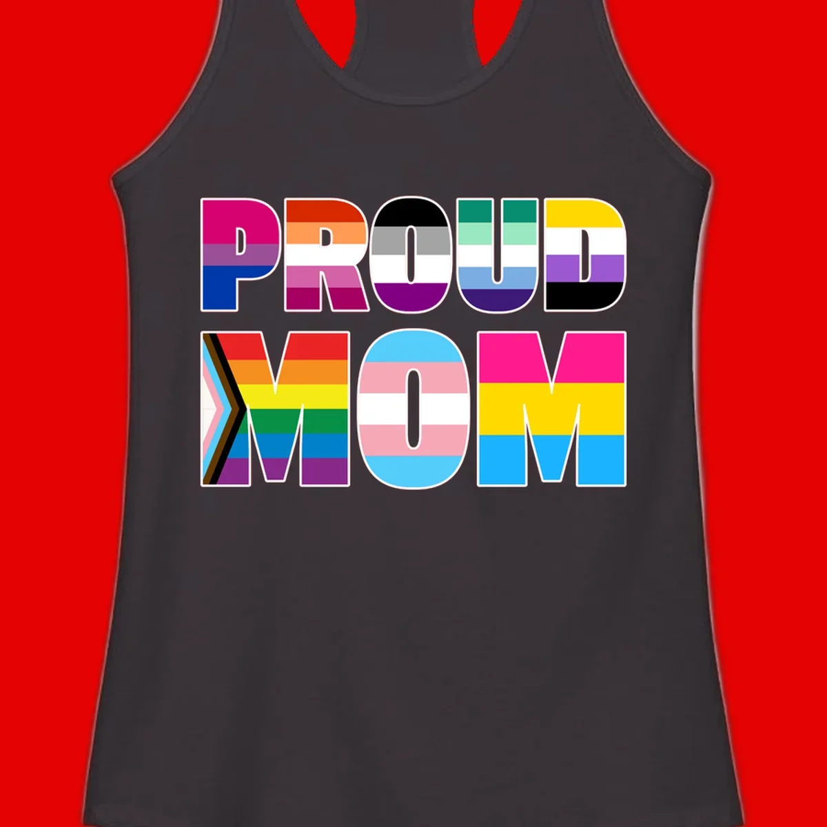 Colorful 'PROUD' letters filled with various pride flags including rainbow, trans, progress pride, and intersex symbols on gray background