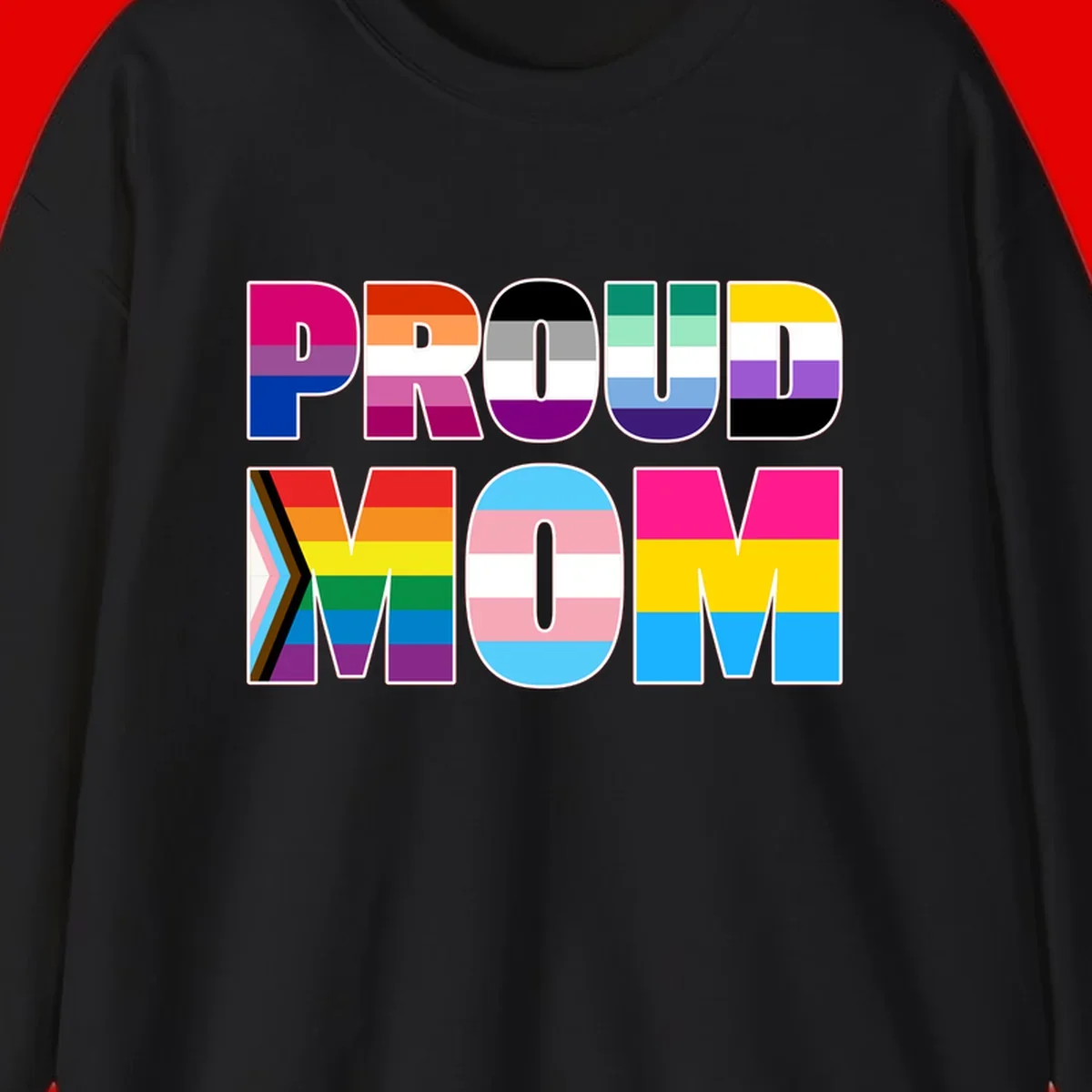 Colorful 'PROUD' letters filled with various pride flags including rainbow, trans, progress pride, and intersex symbols on gray background