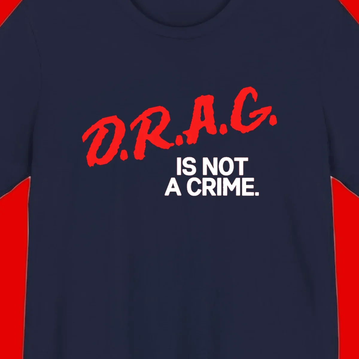 Red hand-drawn lettering spelling 'D.R.A.G.' with white text reading 'IS NOT A CRIME' on gray background