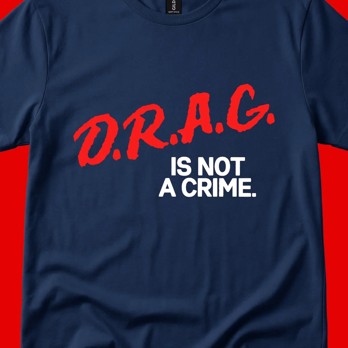 Red hand-drawn lettering spelling 'D.R.A.G.' with white text reading 'IS NOT A CRIME' on gray background
