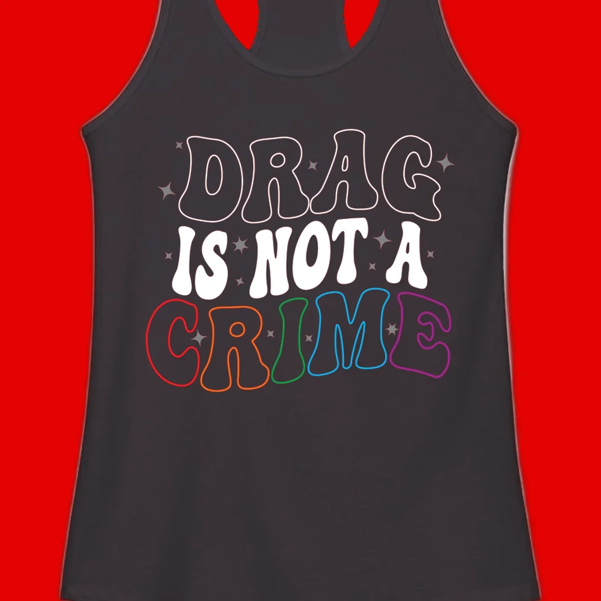 Drag is not a crime design with white and rainbow-colored outlined text on gray background