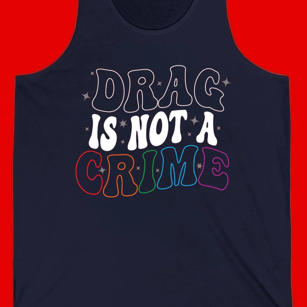 Drag is not a crime design with white and rainbow-colored outlined text on gray background