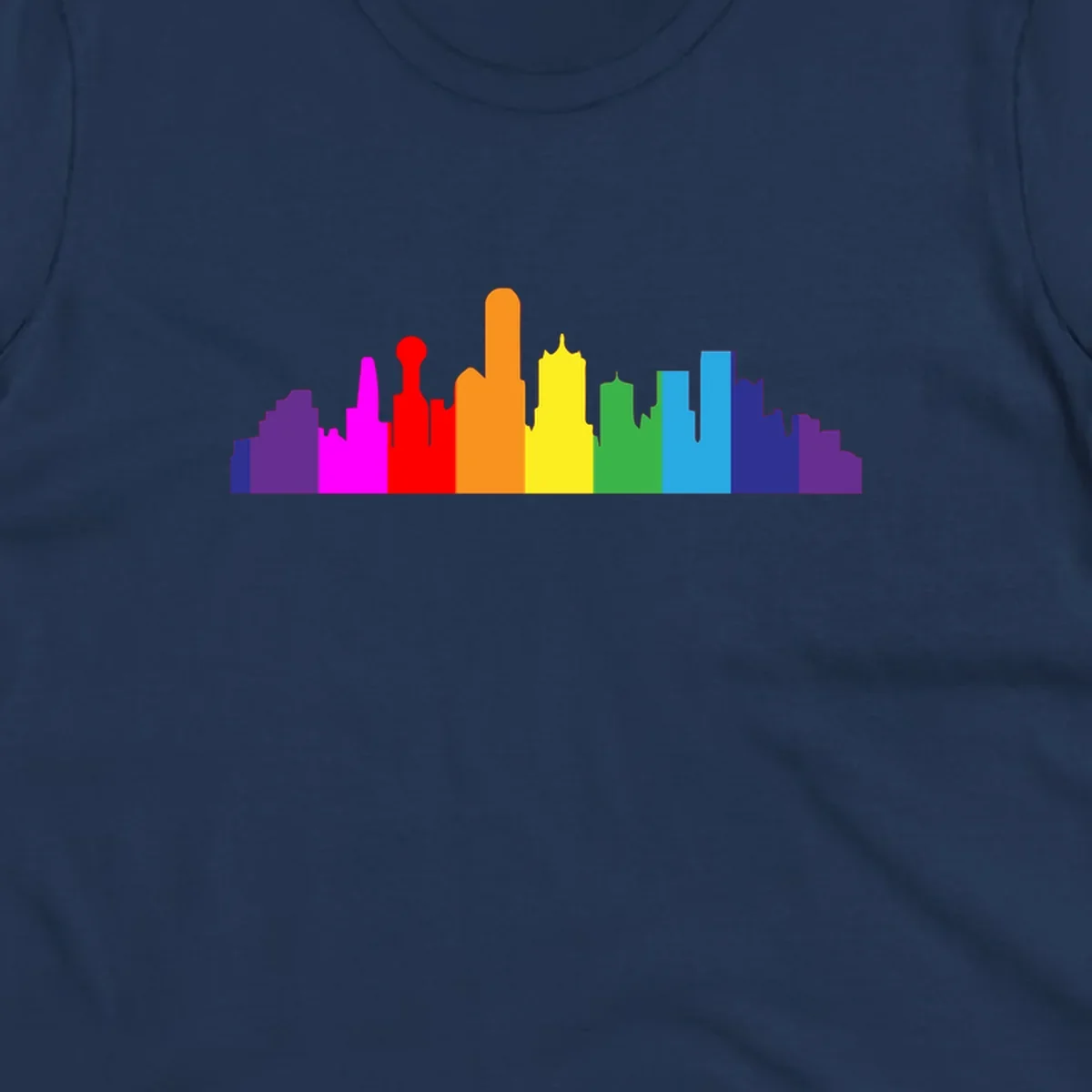 Colorful city skyline silhouette in rainbow pride colors transitioning from purple through red, orange, yellow, green, cyan and blue