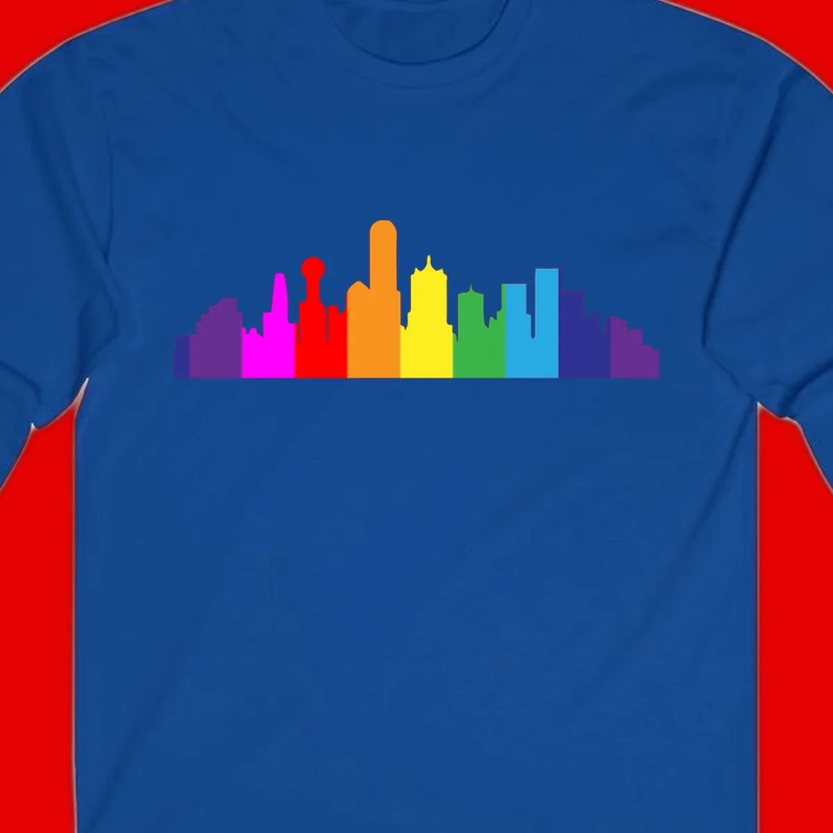 Colorful city skyline silhouette in rainbow pride colors transitioning from purple through red, orange, yellow, green, cyan and blue