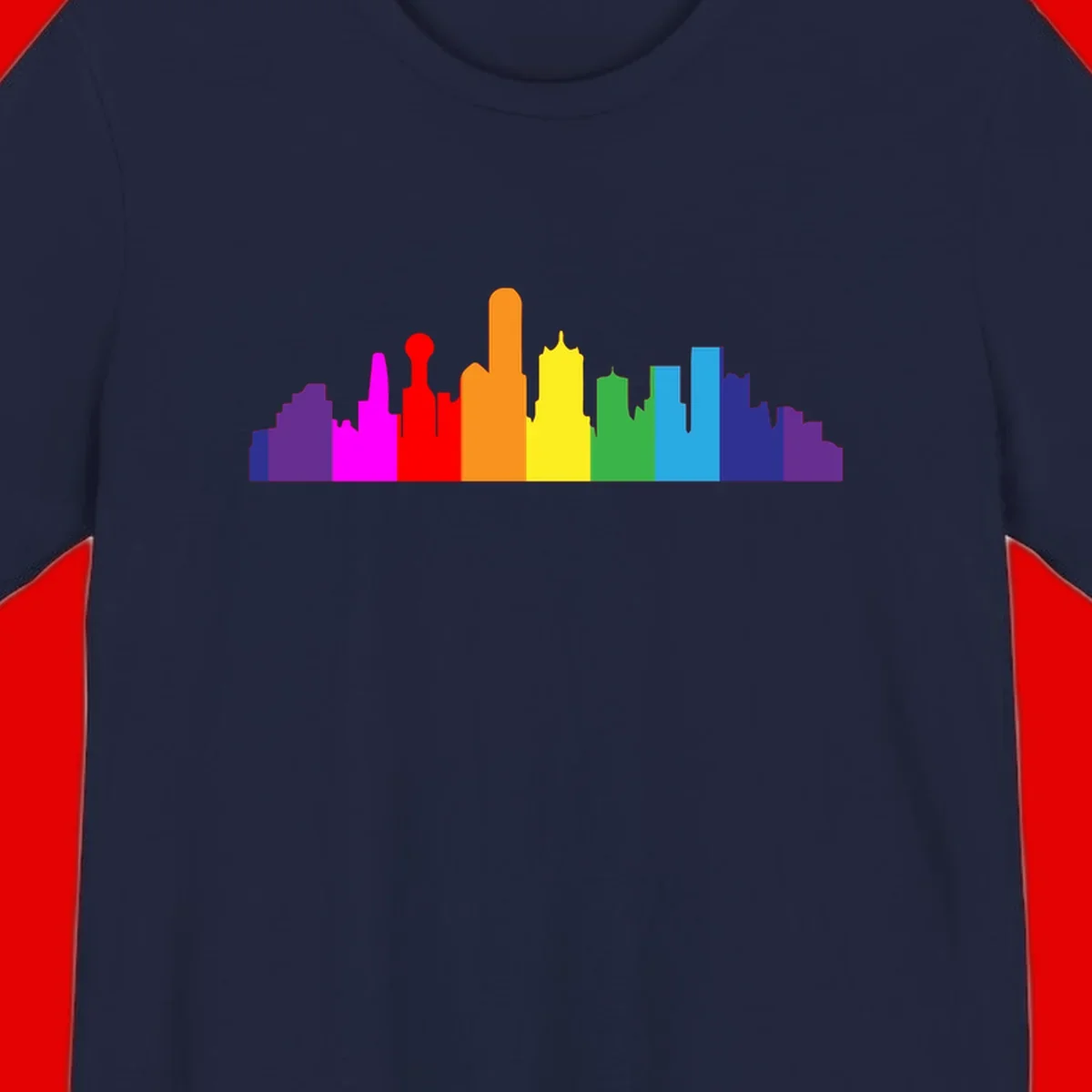Colorful city skyline silhouette in rainbow pride colors transitioning from purple through red, orange, yellow, green, cyan and blue