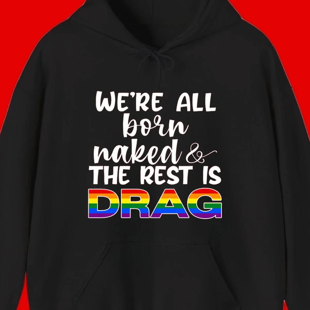Born naked rest is drag design with rainbow pride flag letters spelling DRAG in white text on gray background