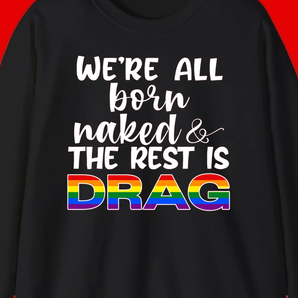 Born naked rest is drag design with rainbow pride flag letters spelling DRAG in white text on gray background