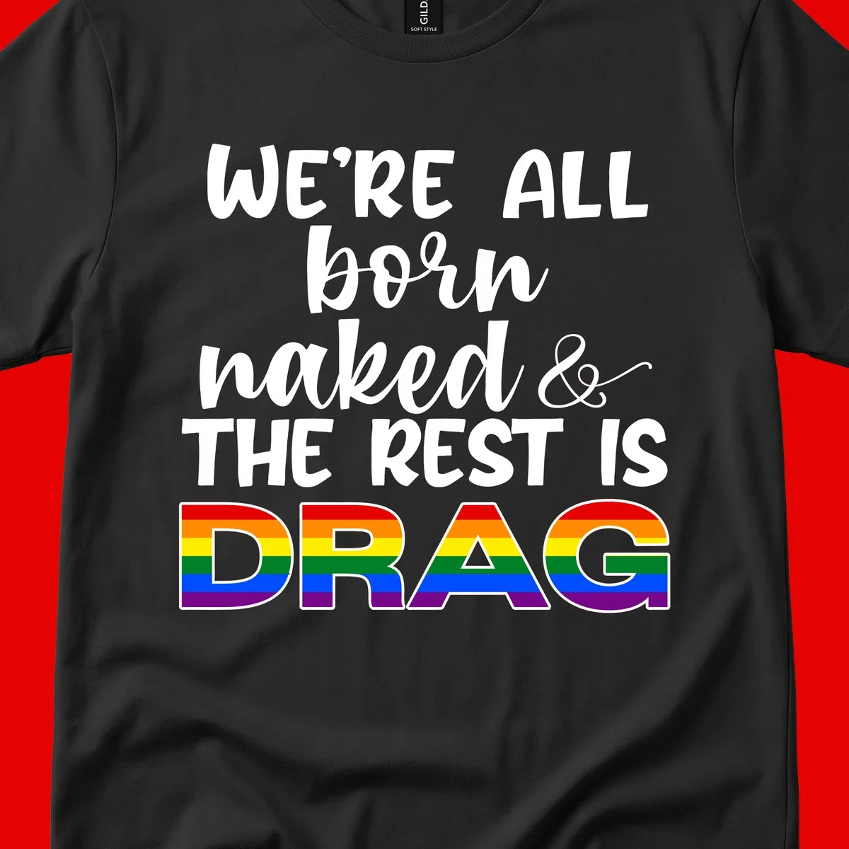 Born naked rest is drag design with rainbow pride flag letters spelling DRAG in white text on gray background