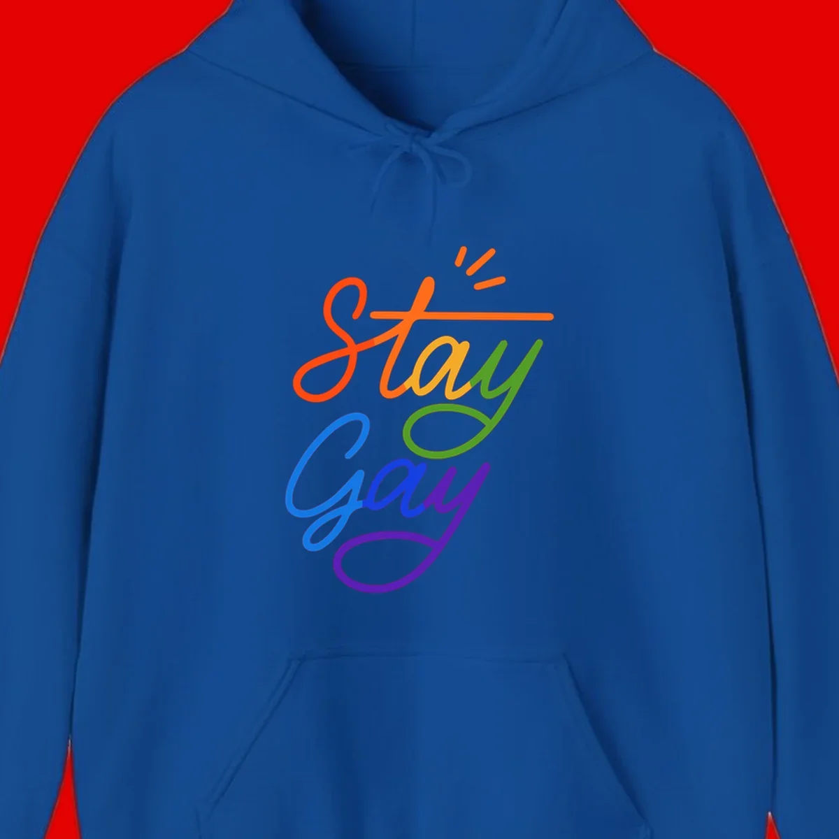 Rainbow gradient text reading 'Stay Gay' with a green checkmark and sparkle accents on gray background