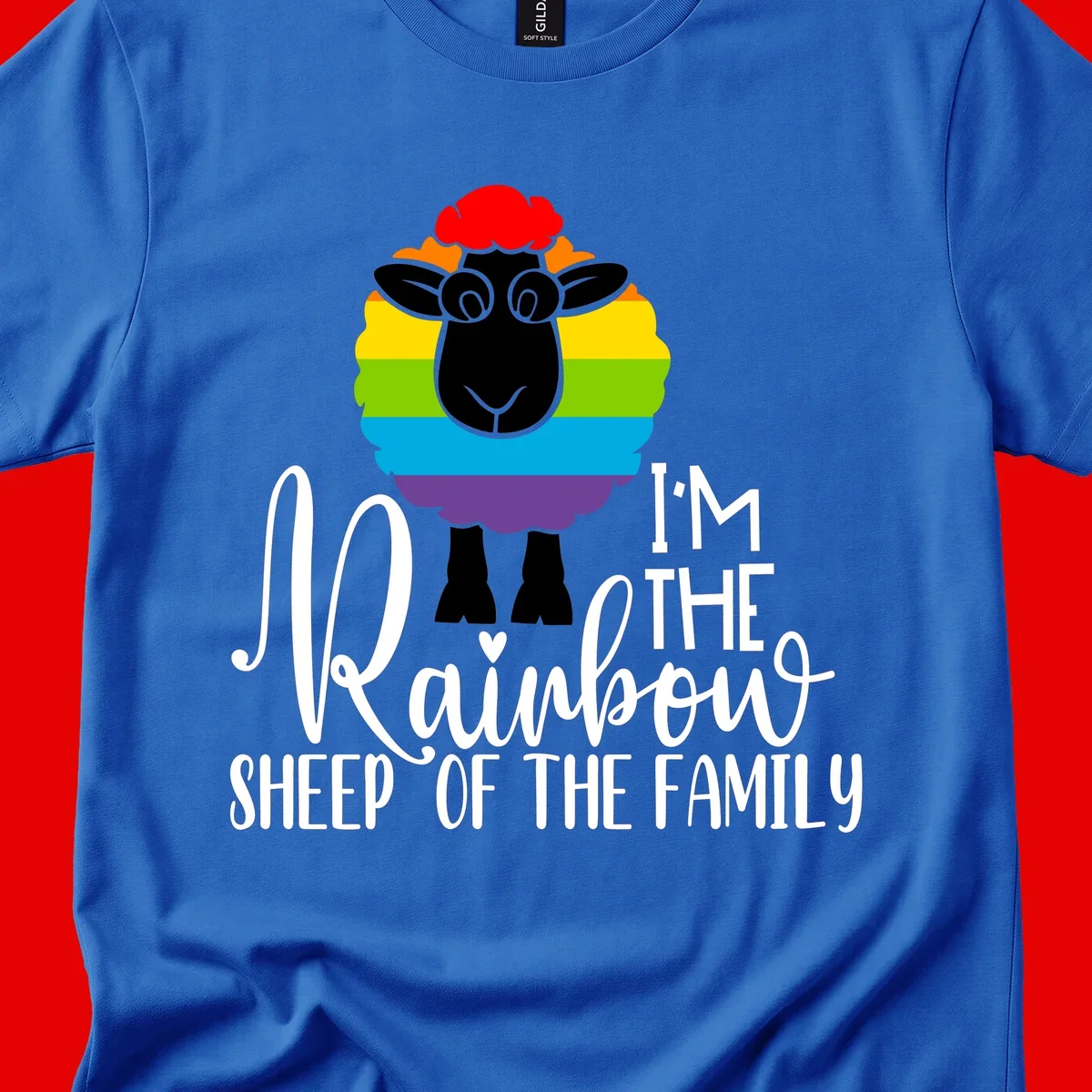 Cartoon sheep with rainbow-striped wool and text 'I'm The Rainbow Sheep Of The Family' celebrating pride and individuality