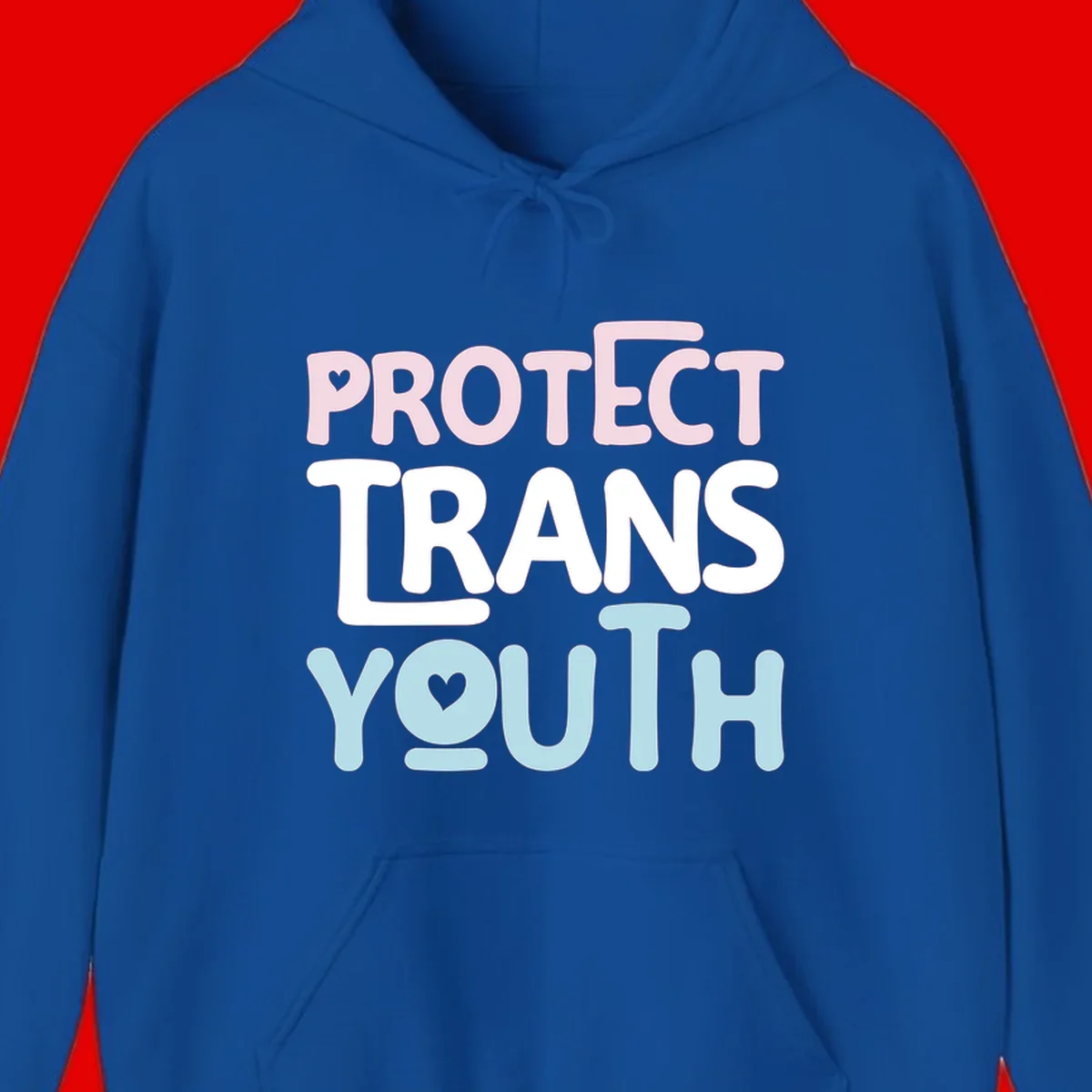 Bold colorful text reading 'PROTECT TRANS YOUTH' with pink and light blue lettering and small hearts, advocating for trans rights and youth support.