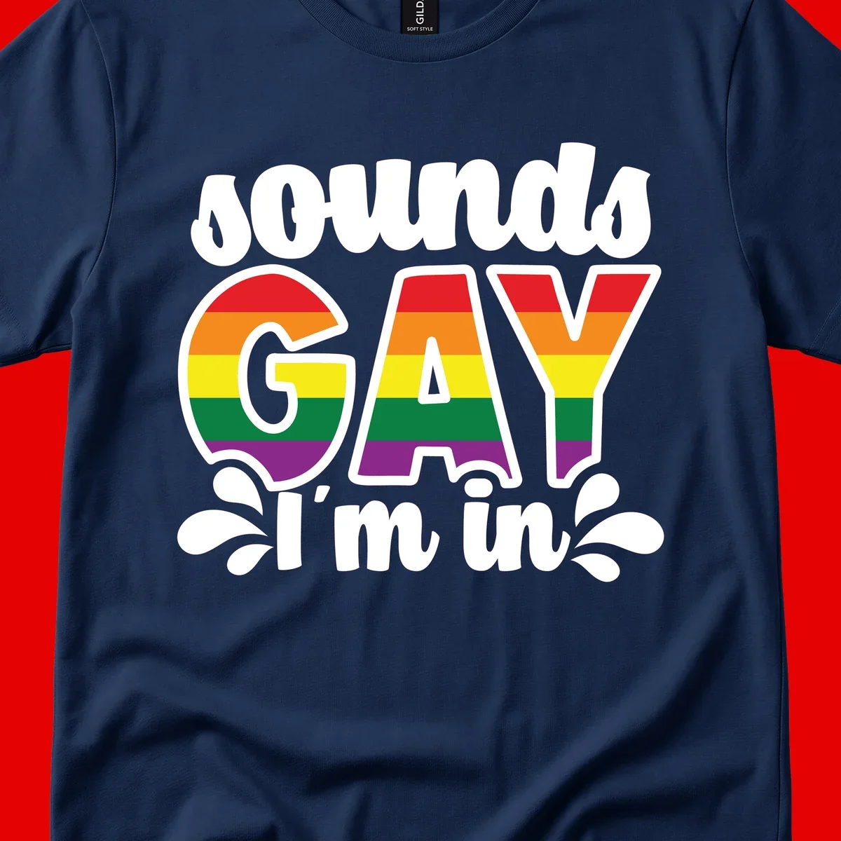 Rainbow pride flag striped lettering spelling 'PROUD GAY I'm in' with decorative flourishes on gray background