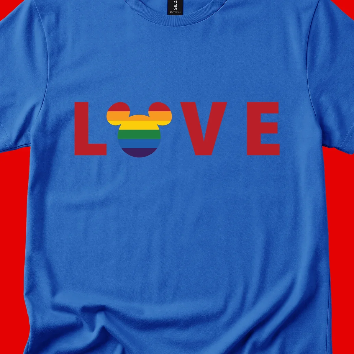 Love Pride Mouse Ears design featuring bold red LOVE text with rainbow-striped Mickey Mouse head combining Disney and LGBTQ Pride imagery