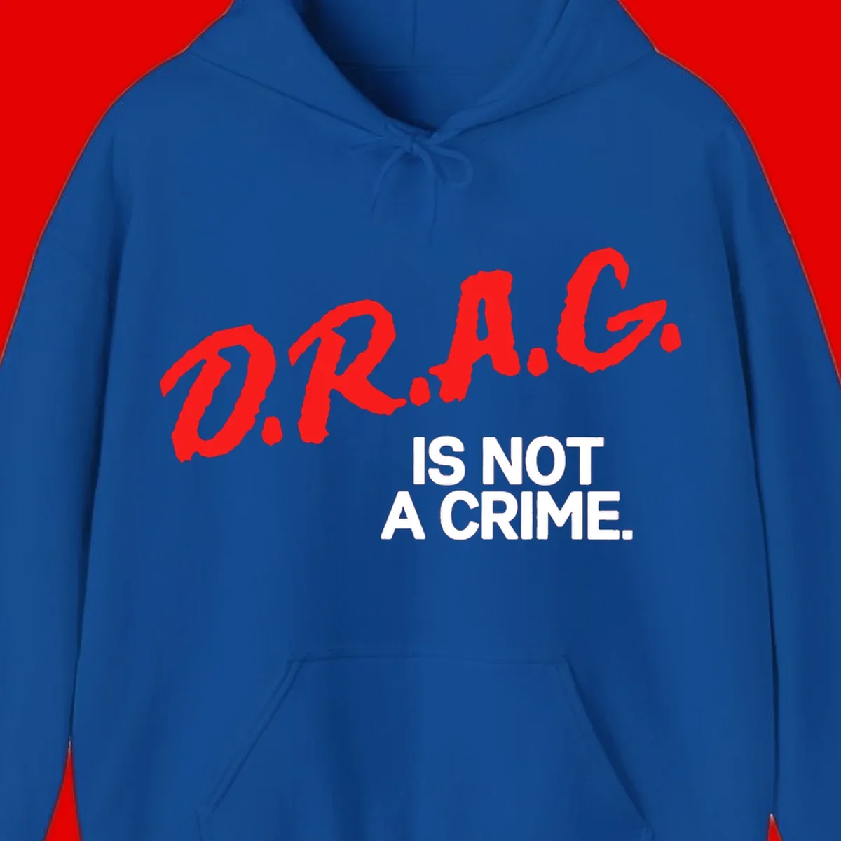 Bold red LGBTQ+ letters with white text reading 'IS NOT A CRIME' on gray background, pride statement design.