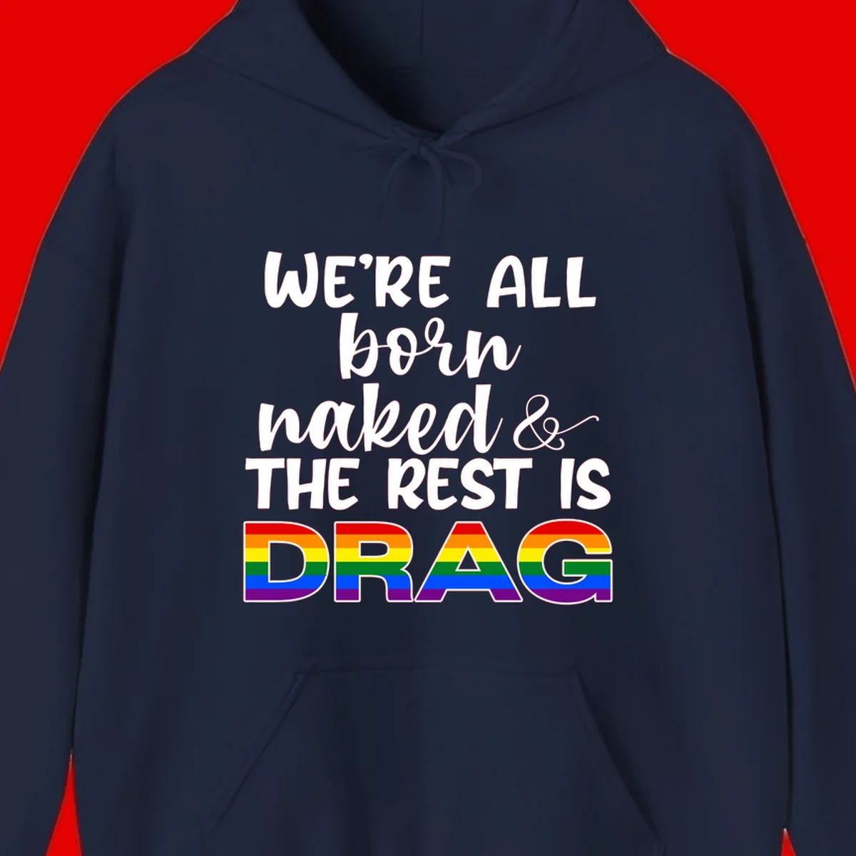 Born naked rest is drag pride design with rainbow flag colored DRAG lettering and inspirational quote text on gray background