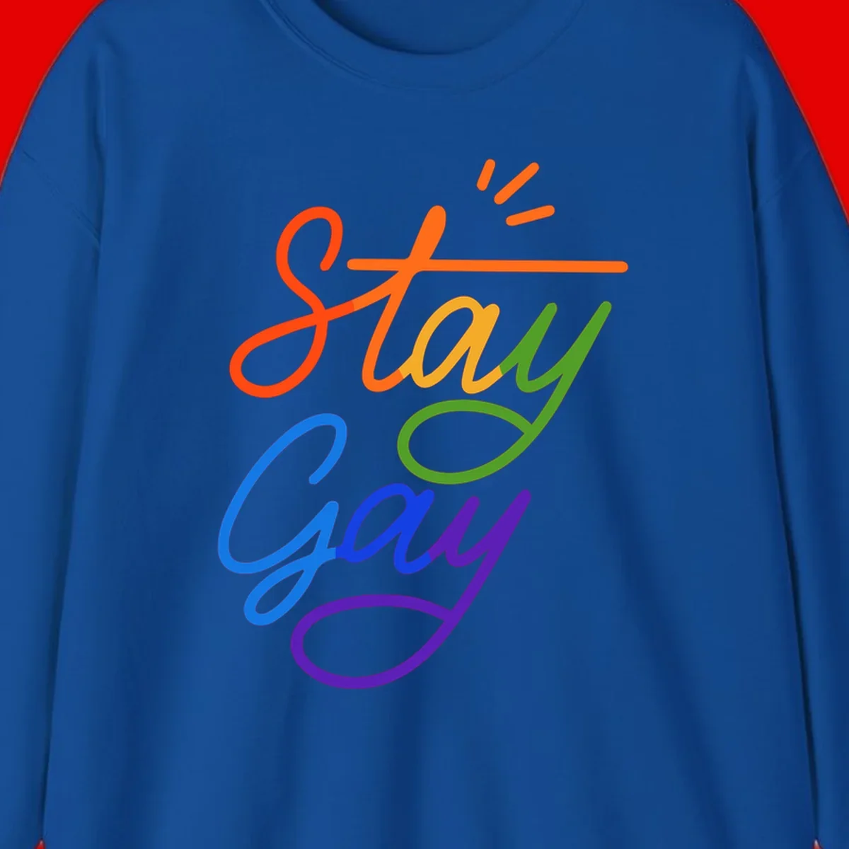 Colorful rainbow text reading 'Stay Gay' with green checkmark and orange exclamation marks, celebrating LGBTQ+ pride