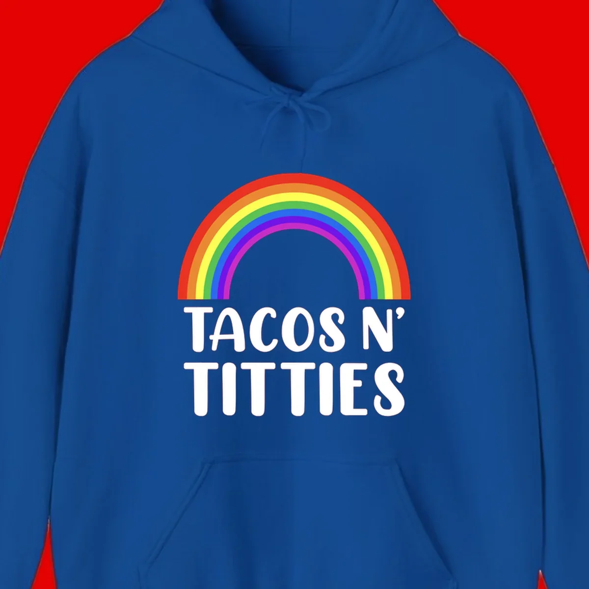 Colorful rainbow arc above white text reading 'TACOS N' TACOS' on gray background, celebrating Pride with playful design
