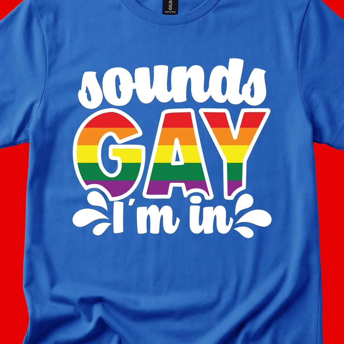 Proud gay I'm in design with rainbow pride flag stripes filling large bold letters and white decorative flourishes