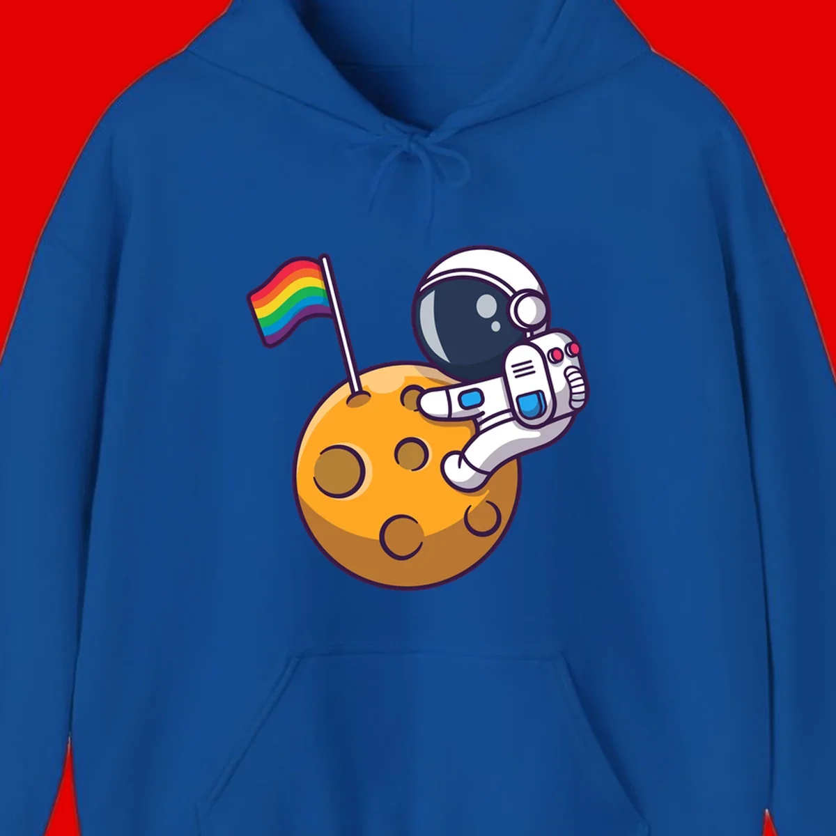 Cartoon astronaut in white space suit holding rainbow pride flag on golden moon surface with craters
