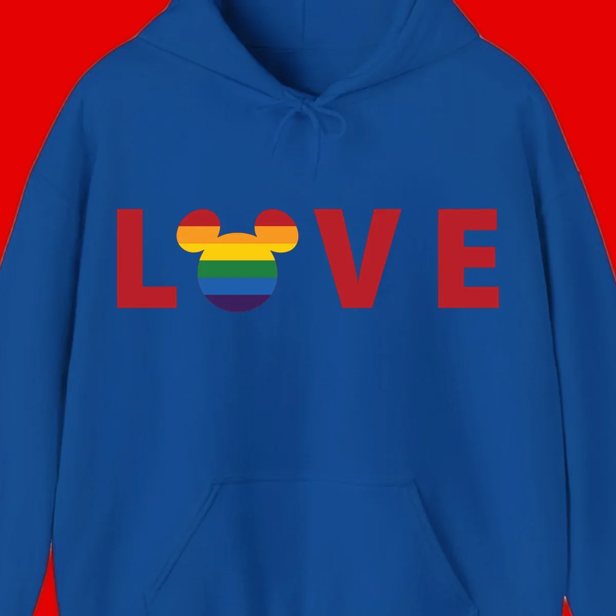 Love pride mouse ears design with rainbow-striped Mickey head icon and colorful pride flag stripes on gray background