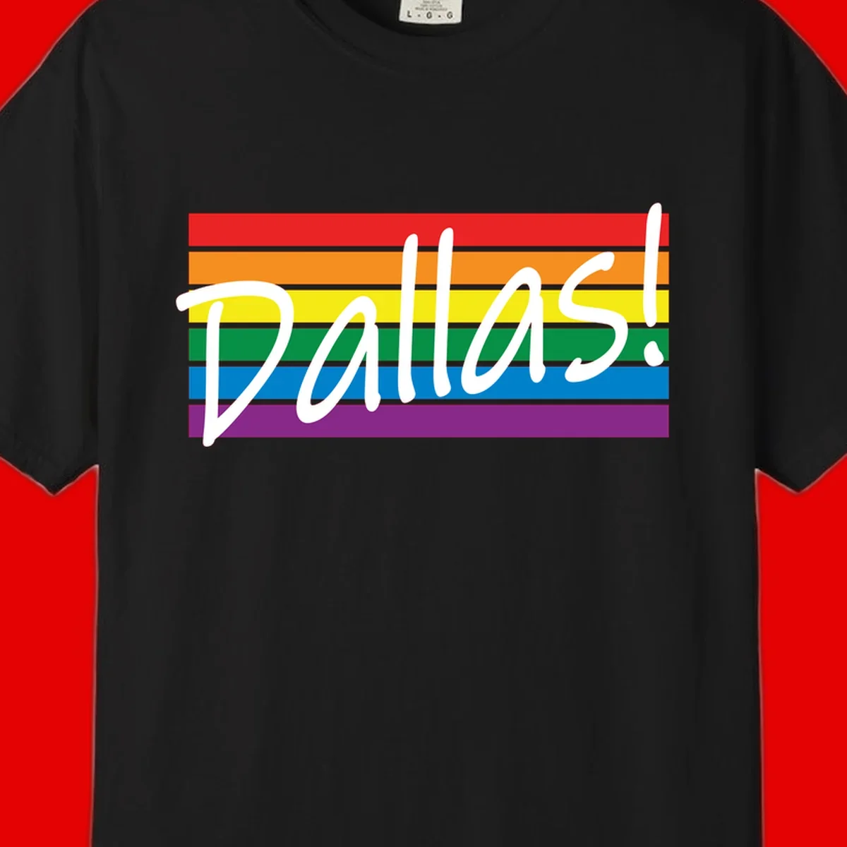 Pallas pride rainbow design with white handwritten text over horizontal stripes in red, orange, yellow, green, blue, and purple