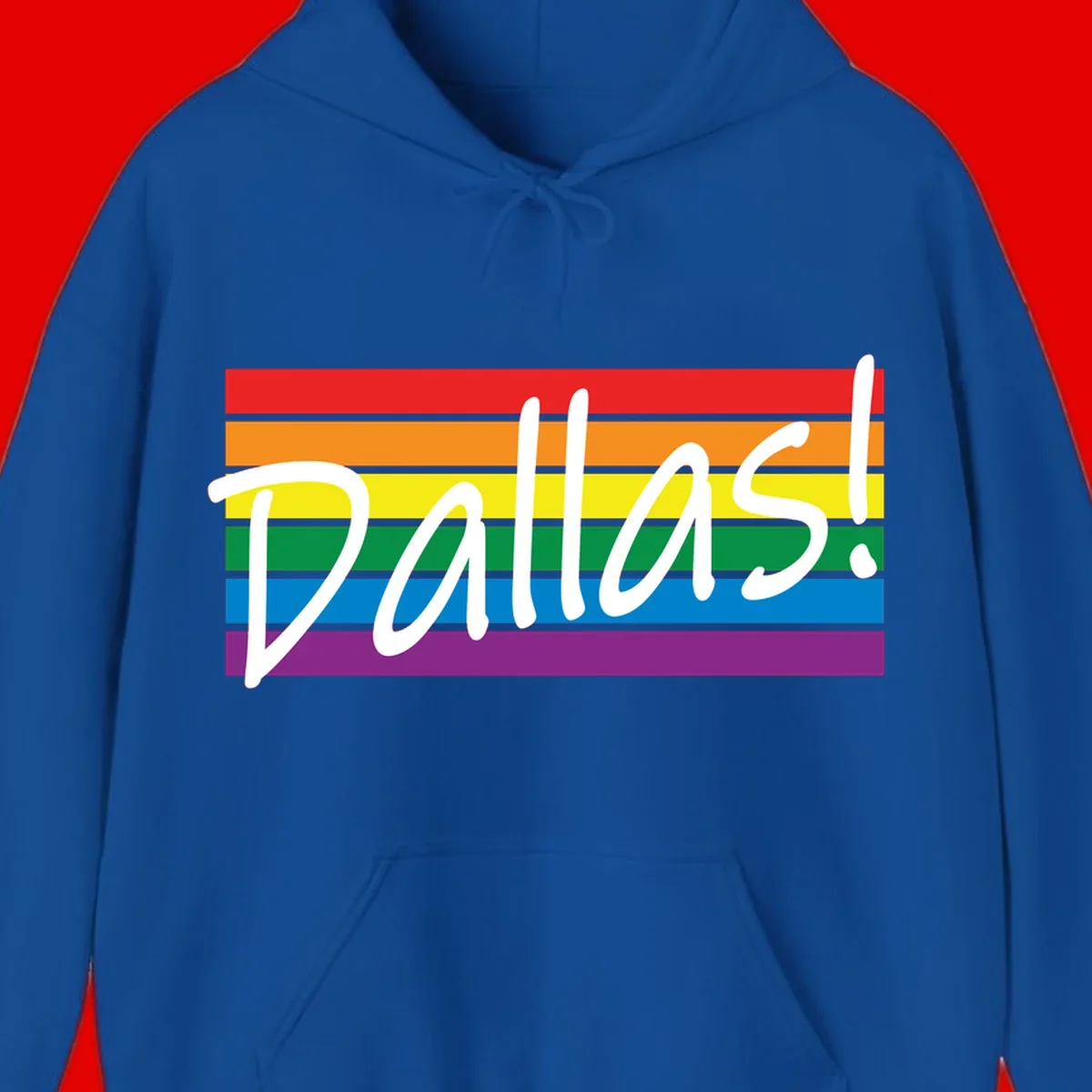 Pallas pride rainbow design with white handwritten text over horizontal stripes in red, orange, yellow, green, blue, and purple