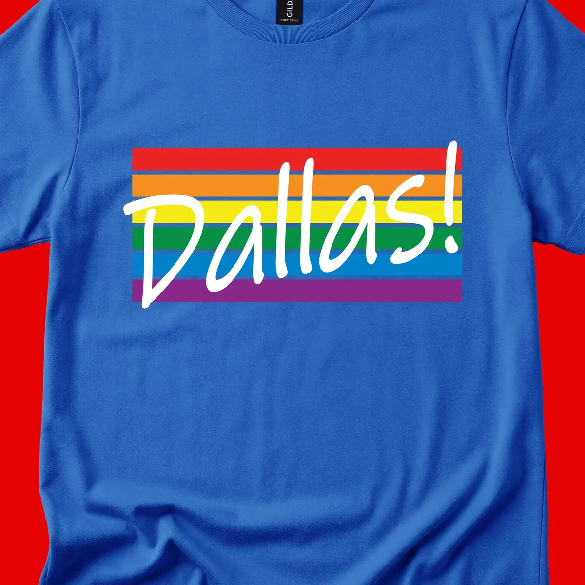Pallas pride rainbow design with white handwritten text over horizontal stripes in red, orange, yellow, green, blue, and purple