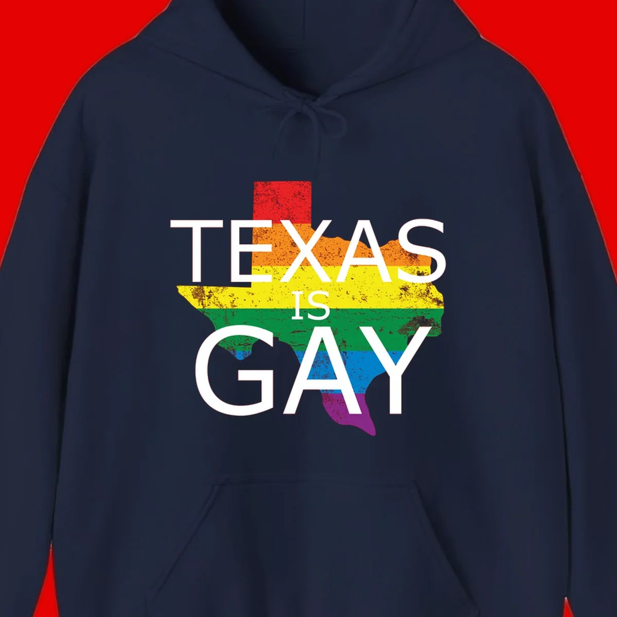 Texas state map filled with rainbow pride flag colors and white text reading 'Texas Is A Gay'
