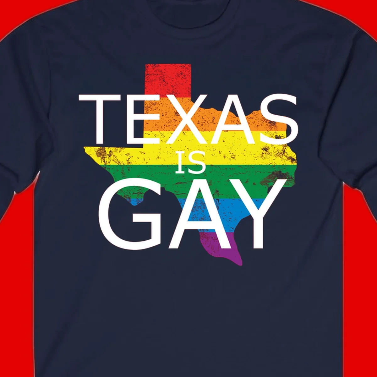 Texas state map filled with rainbow pride flag colors and white text reading 'Texas Is A Gay'