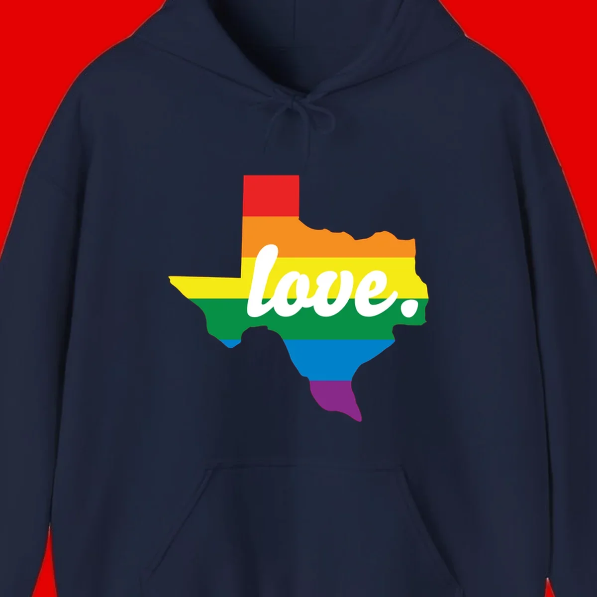 Texas state outline filled with rainbow pride stripes and white script text reading 'love.'