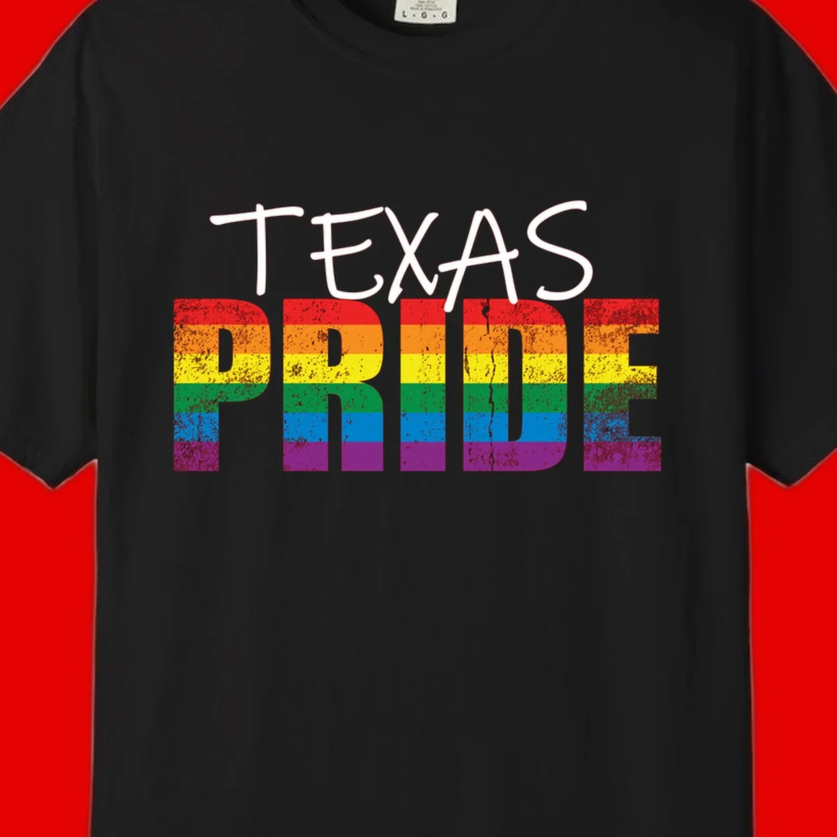 White 'TEXAS PRIDE' text with 'PRIDE' filled in rainbow flag stripes on gray background with distressed texture