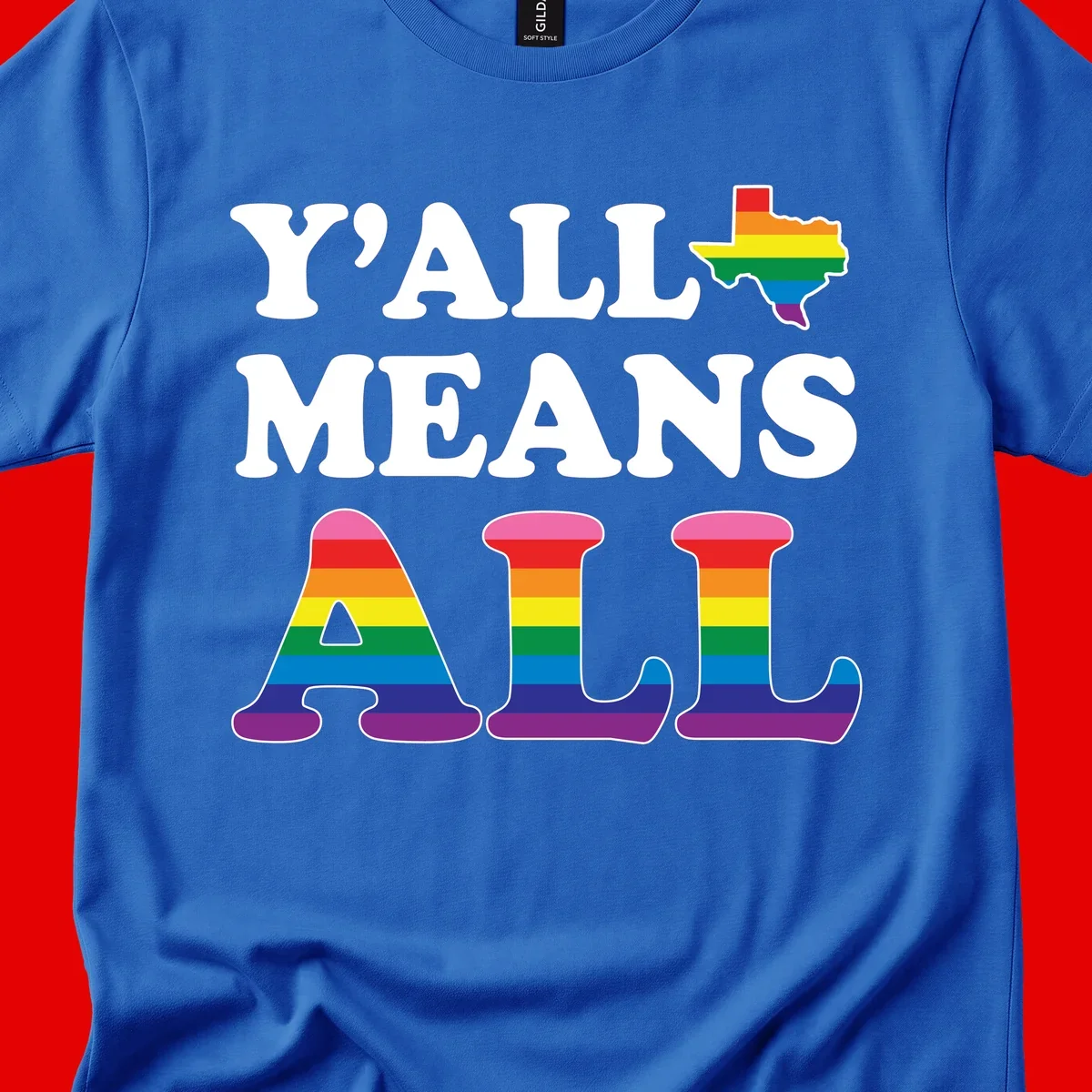 Y'ALL MEANS ALL design with rainbow pride flag colors on Texas map and letter shapes, celebrating LGBTQ+ inclusion