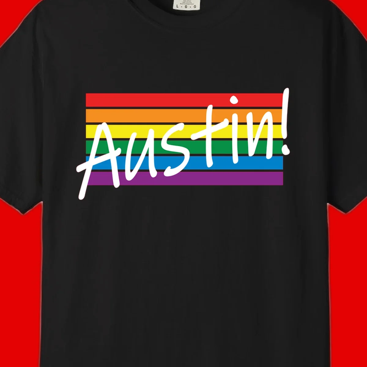Austin pride rainbow flag design with white handwritten text overlaid on six horizontal rainbow stripes