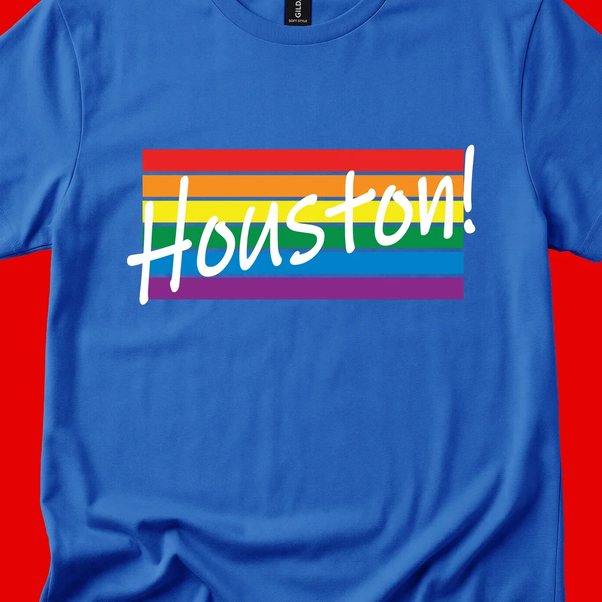 Houston pride celebration design with white handwritten text on rainbow flag stripes in red, orange, yellow, green, blue, and purple