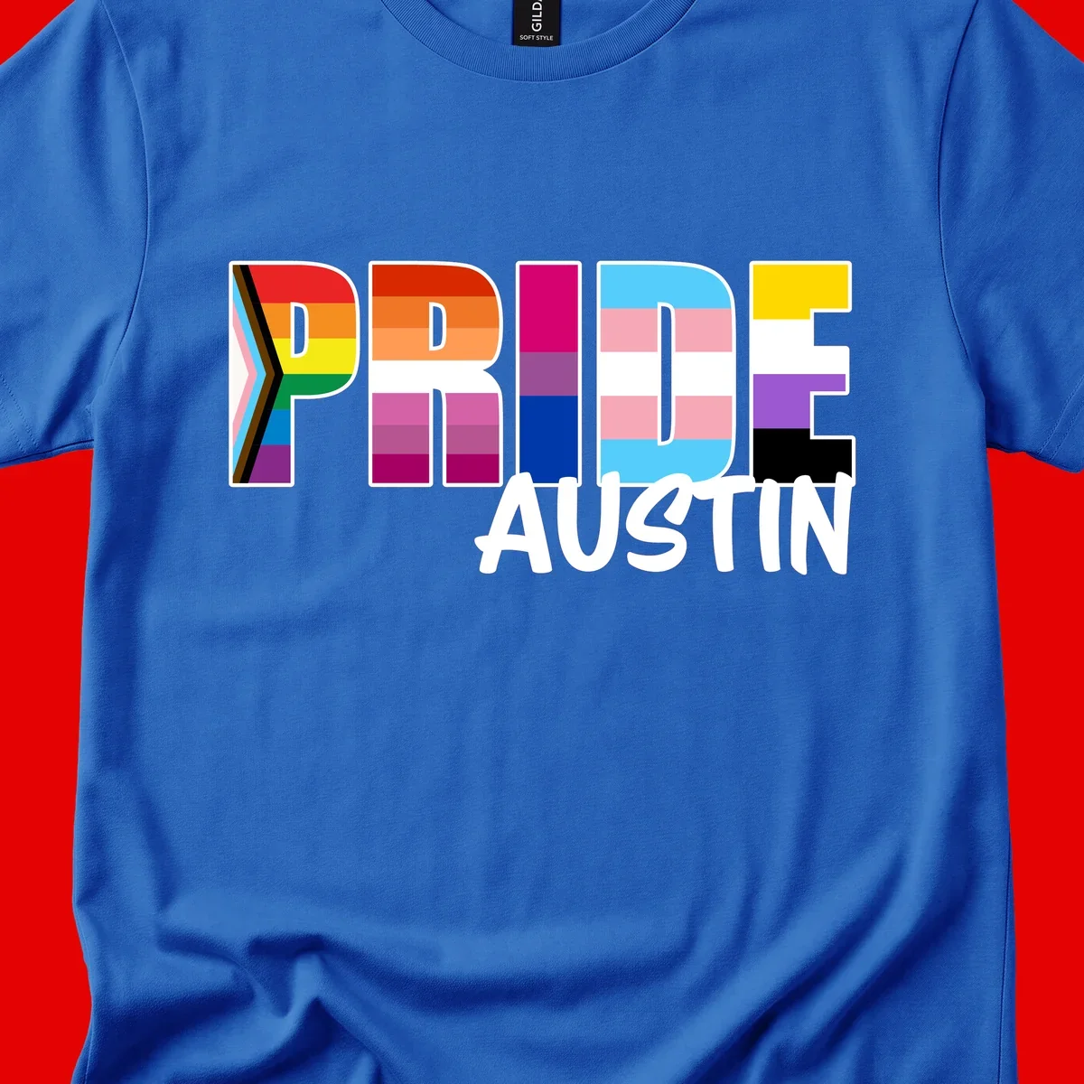 Pride Austin design with rainbow-filled block letters incorporating multiple LGBTQ+ pride flag colors and patterns